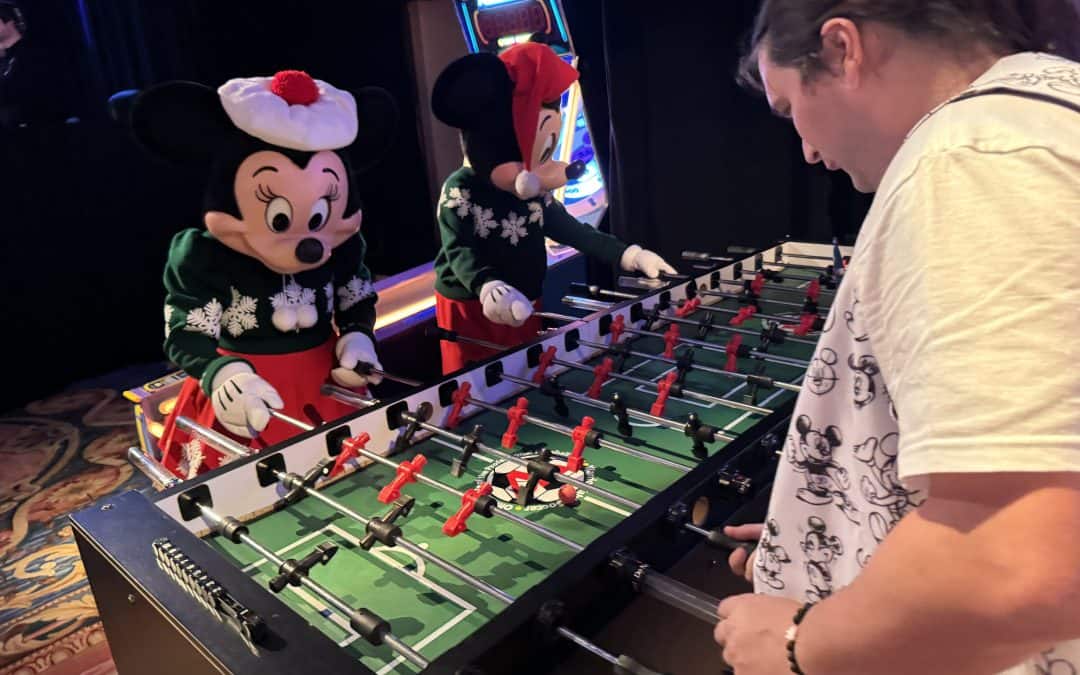 Disney World Christmas Trip report from Mouse Chat Podcast as Mickey and Minnie play fooseball at the boardwalk hotel