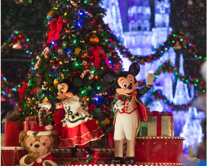 Mickey and Minnie in front of the Christmas tree at Mickey's Very Merry Christmas Party